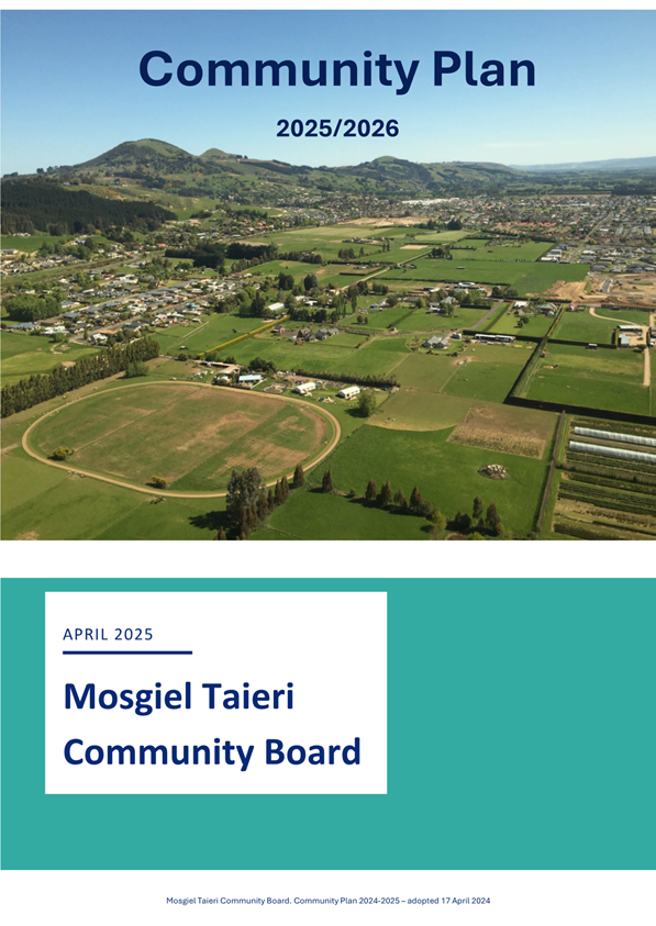 A green landscape with a city and hills

Description automatically generated with medium confidence